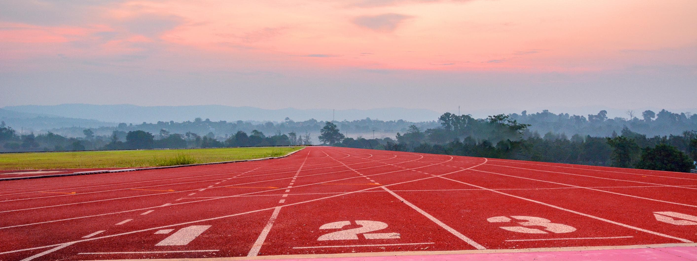 Running track with mountains in background